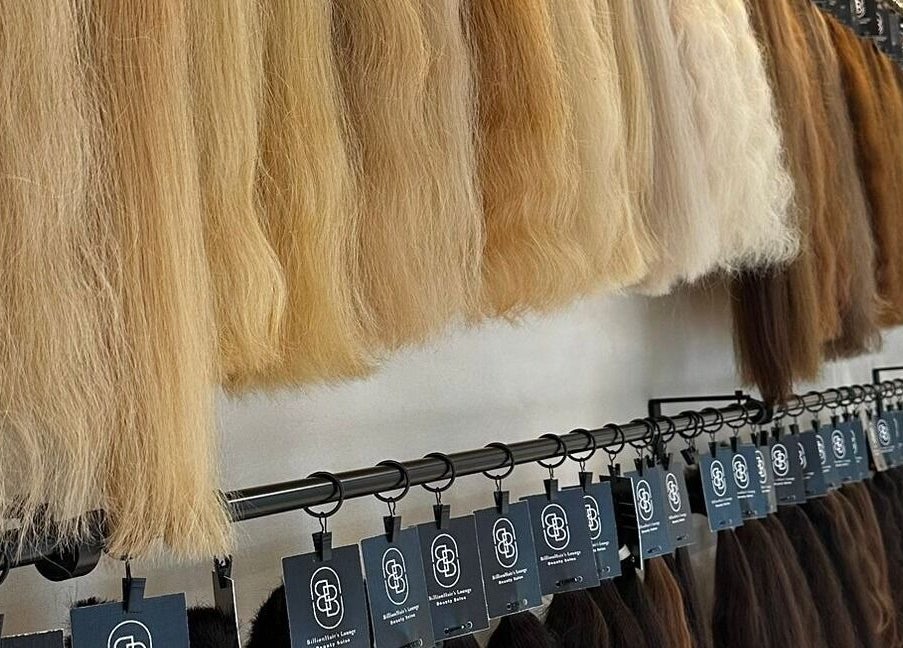 Variety of hair extensions on display at Billionhairs Lounge Beauty Salon, Doha, Doha Municipality, QA.