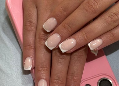 French manicure at Billionhairs Lounge Beauty Salon in Doha, Doha Municipality, QA. Perfectly polished nails.