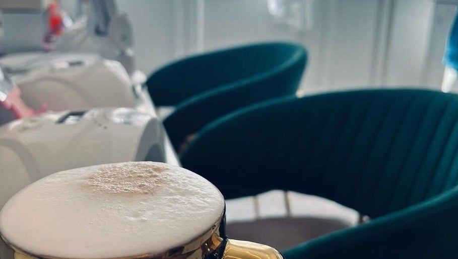 Enjoy a luxury cappuccino in the cozy seating area at Fran’s Nail Boutique, Il-mosta, MT.