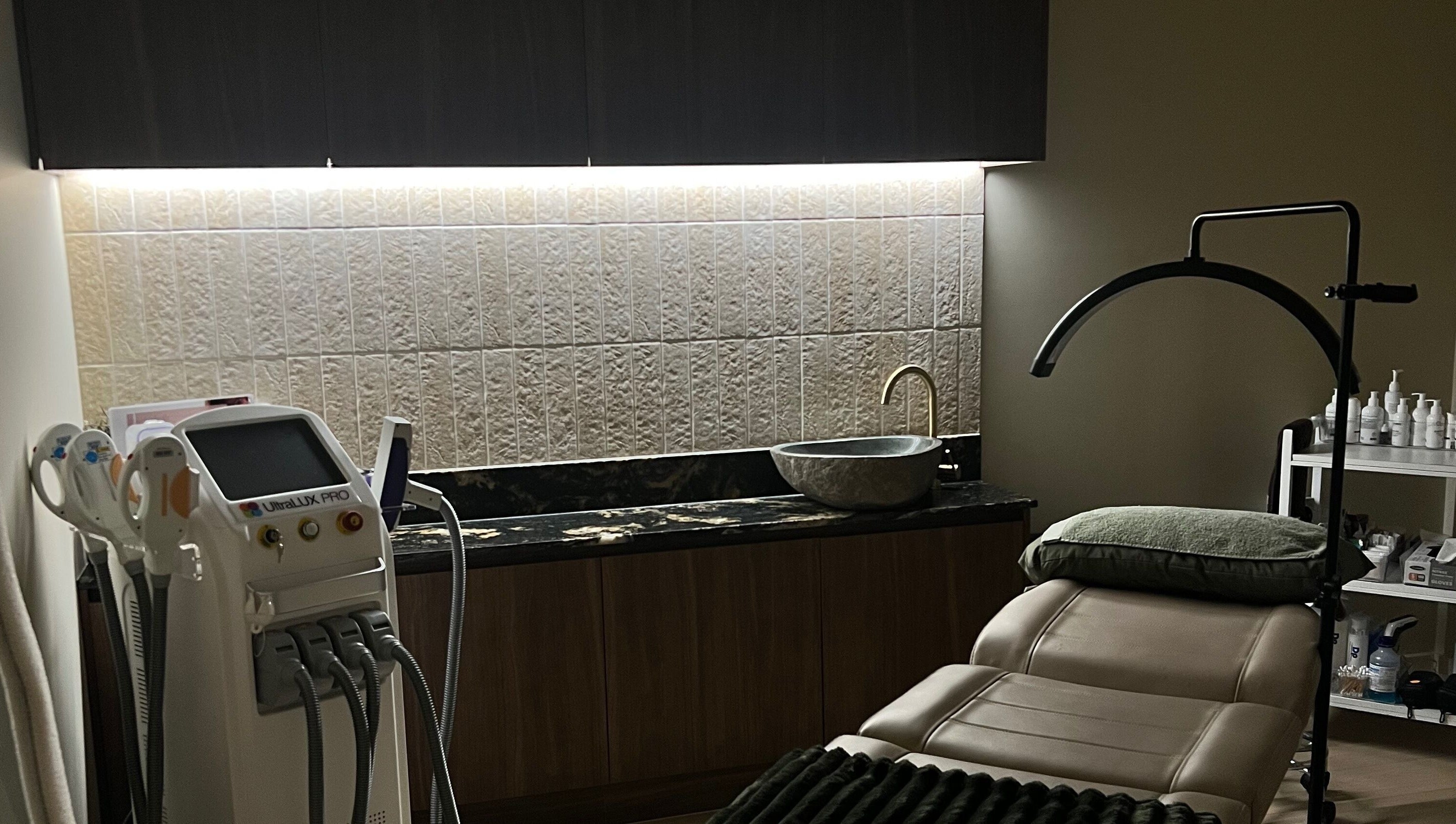 Elegant treatment room at The Dermal Den, Northcote, Victoria, AU with advanced beauty equipment.