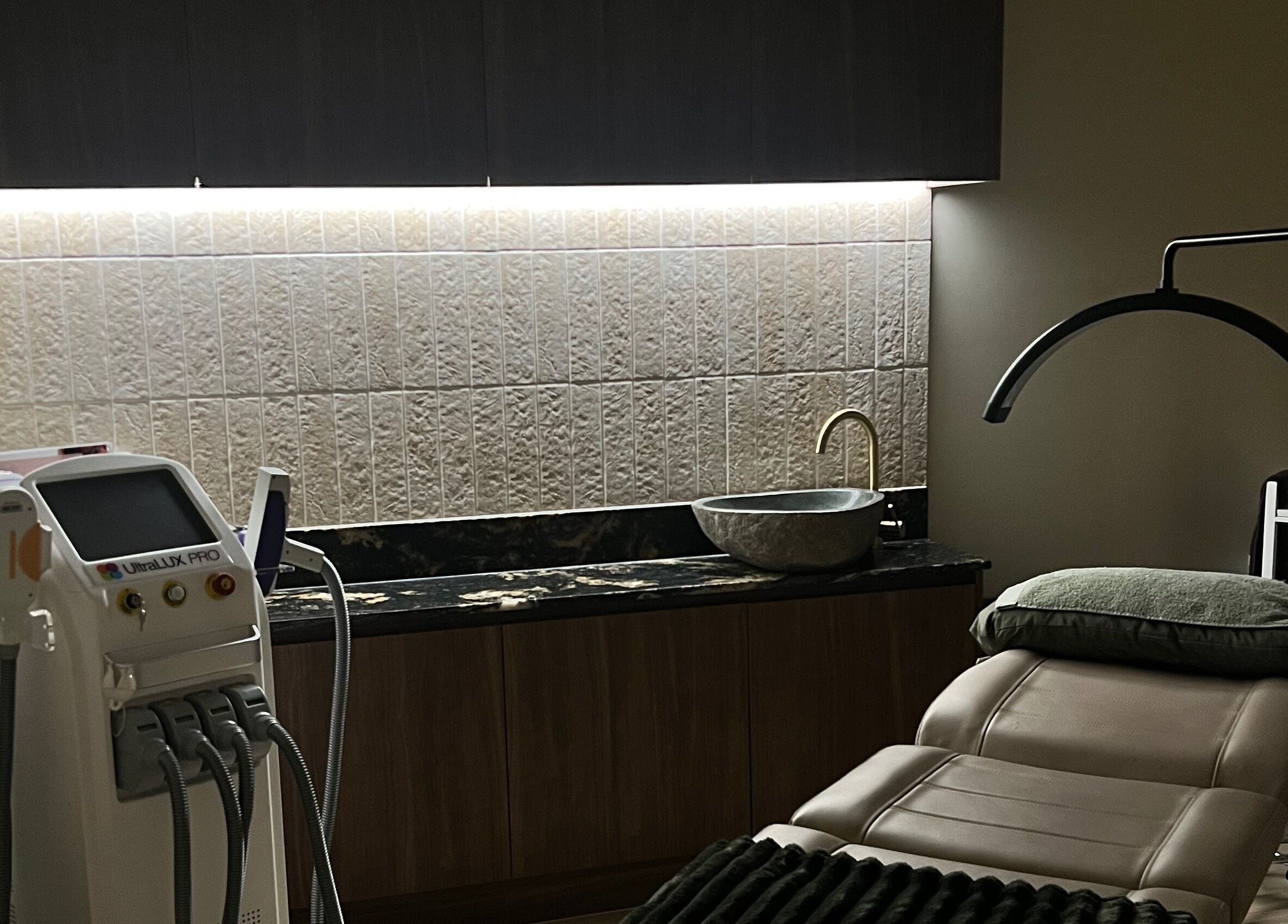 Elegant treatment room at The Dermal Den, Northcote, Victoria, AU with advanced beauty equipment.