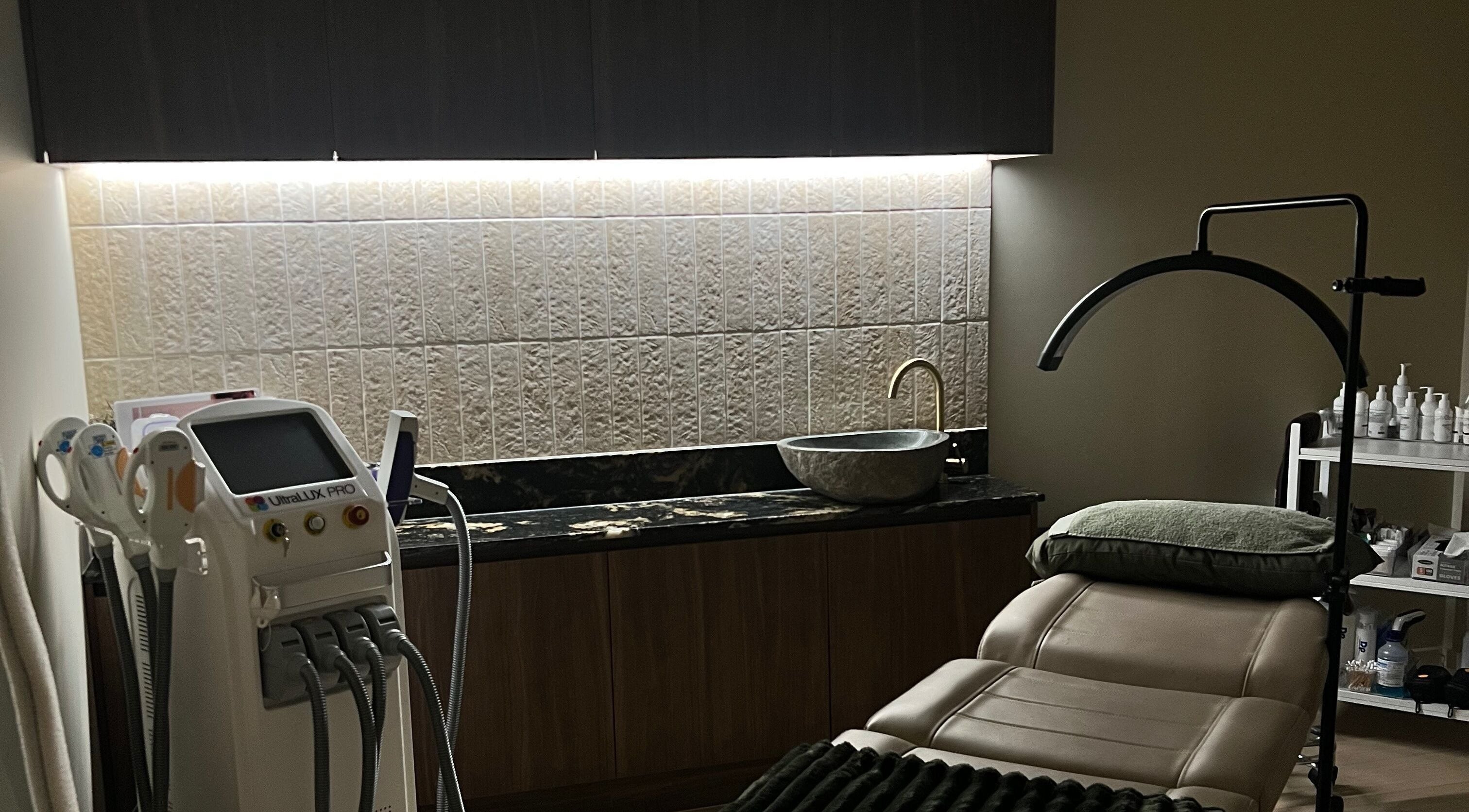 Elegant treatment room at The Dermal Den, Northcote, Victoria, AU with advanced beauty equipment.