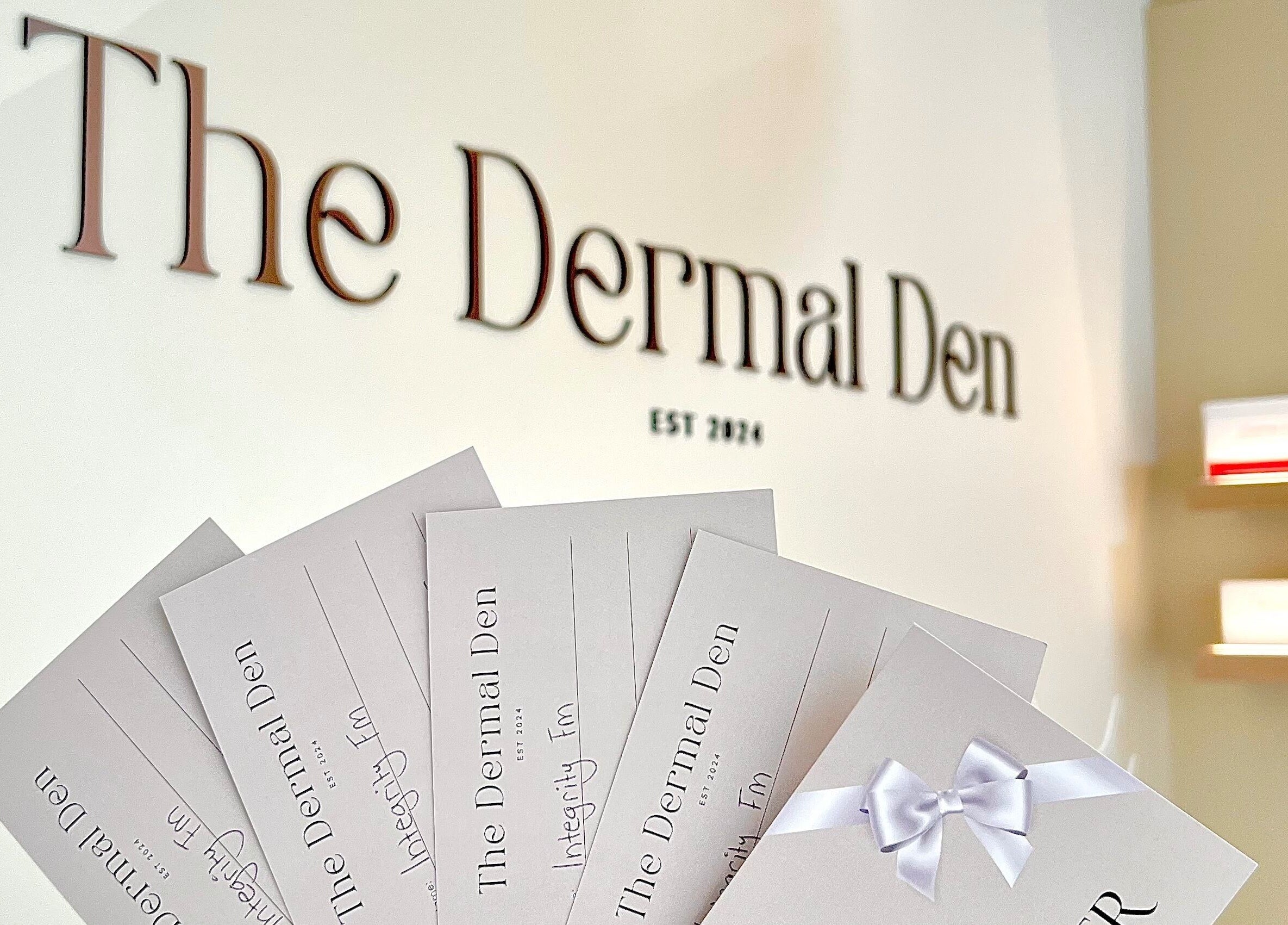 Gift cards at The Dermal Den, Northcote, Victoria, AU, showcasing elegant spa services.