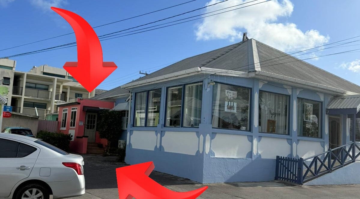 Exterior of Chrysalis Studio & Academy in Bridgetown, Christ Church, BB, showcasing the cozy pink entrance.