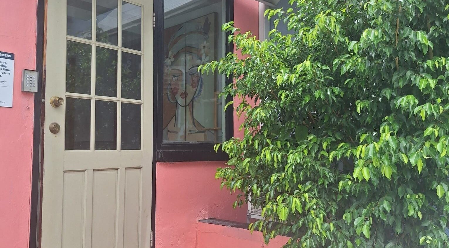 Front door with artistic window at Chrysalis Studio & Academy, Bridgetown, Christ Church, BB.