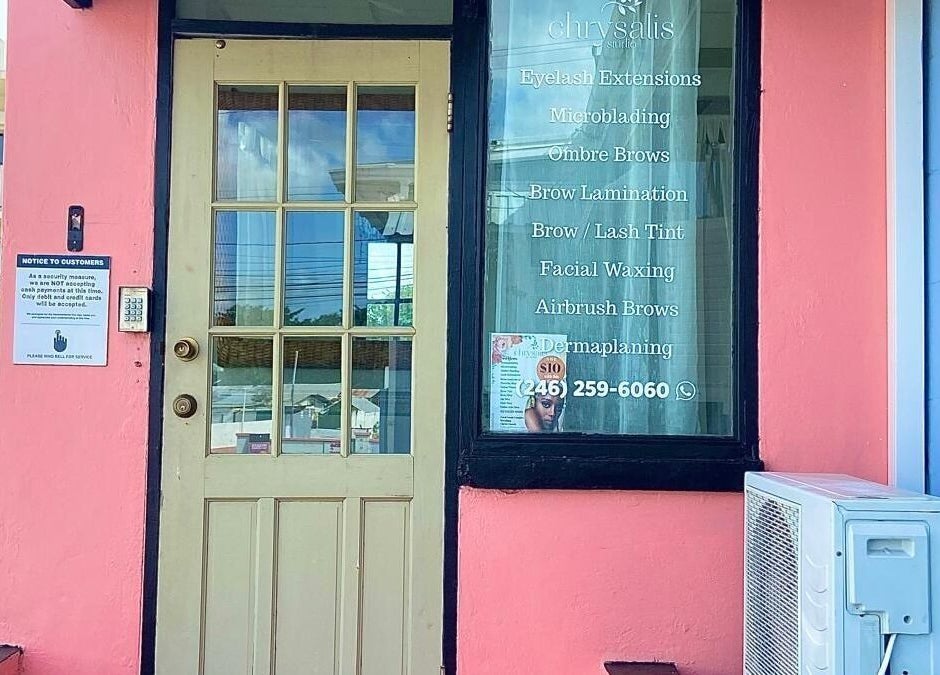 Entrance of Chrysalis Studio & Academy in Bridgetown, Christ Church, BB, showcasing services on the window.