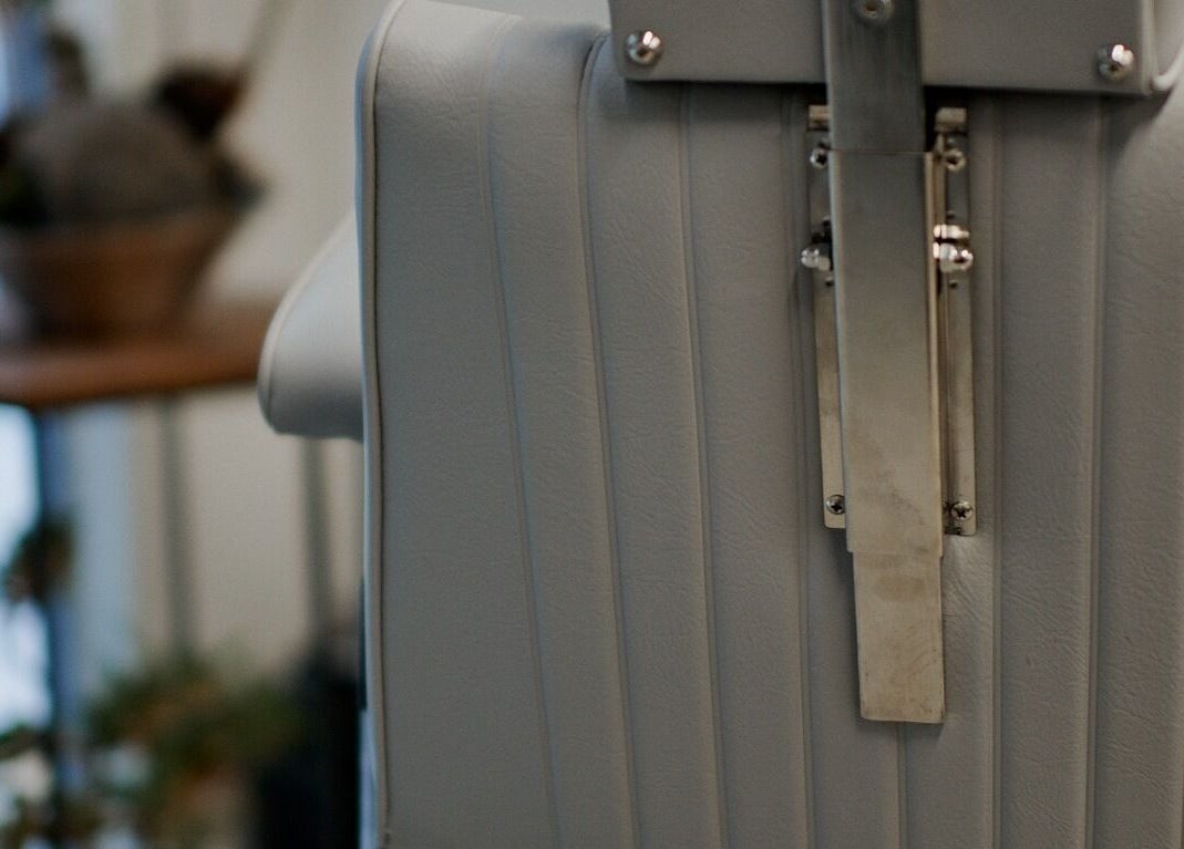 Close-up of luxury chair detail at AndSpace, Hong Kong Island, HK, enhancing office elegance.