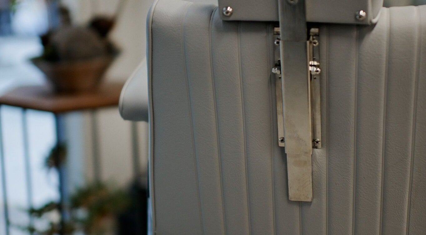 Close-up of luxury chair detail at AndSpace, Hong Kong Island, HK, enhancing office elegance.