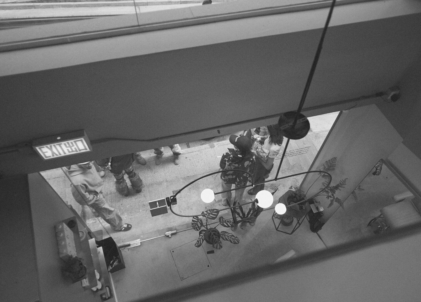 Overhead view of guests at AndSpace, Hong Kong Island, HK embracing a chic industrial vibe.