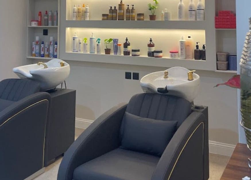 Chic hair washing stations at Four Sisters Salon in Shaqra, Riyadh Province, SA offering premium services.