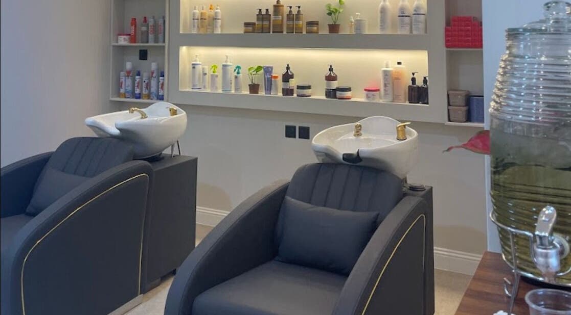 Chic hair washing stations at Four Sisters Salon in Shaqra, Riyadh Province, SA offering premium services.