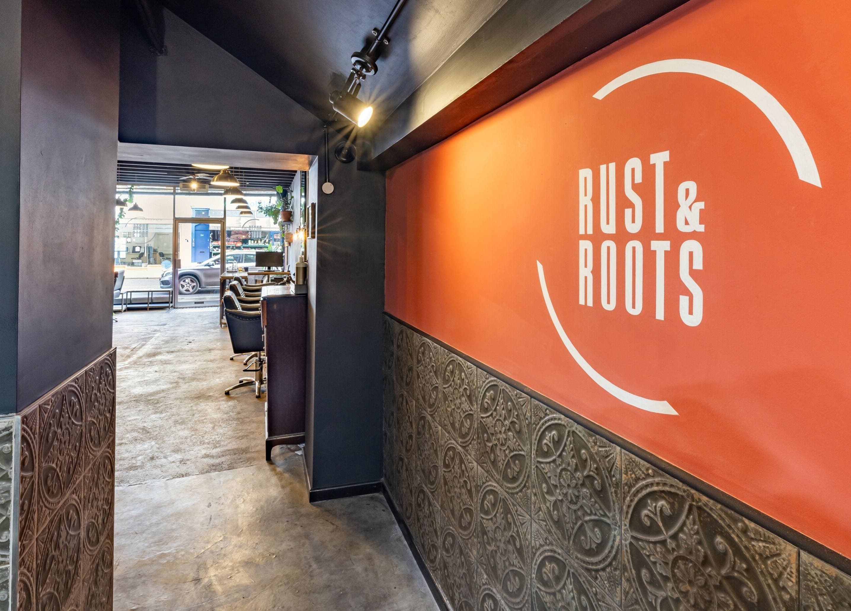 Stylish interior of Rust & Roots salon in London, England, GB with sleek decor and inviting atmosphere.