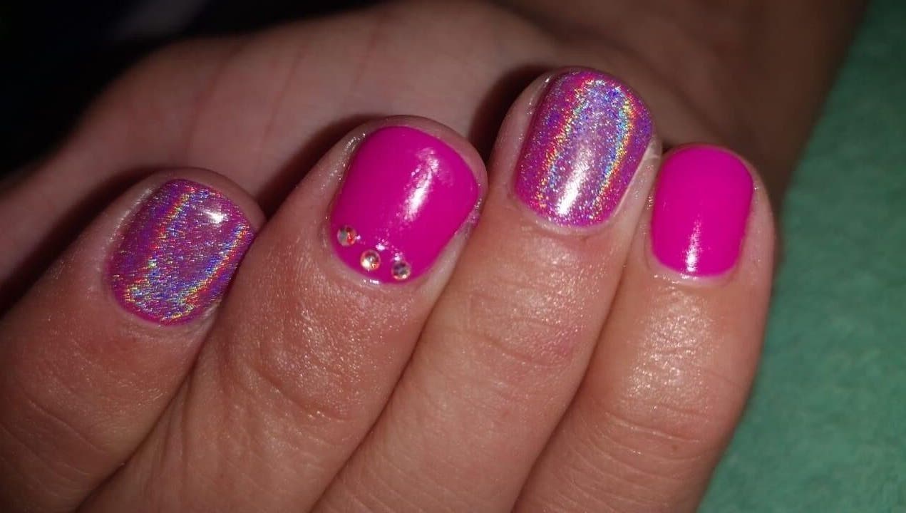 Vibrant pink nails with sparkles at Nail It By Lola, Cape Town, Western Cape, ZA.