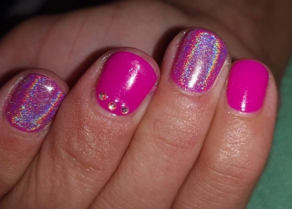 Vibrant pink nails with sparkles at Nail It By Lola, Cape Town, Western Cape, ZA.