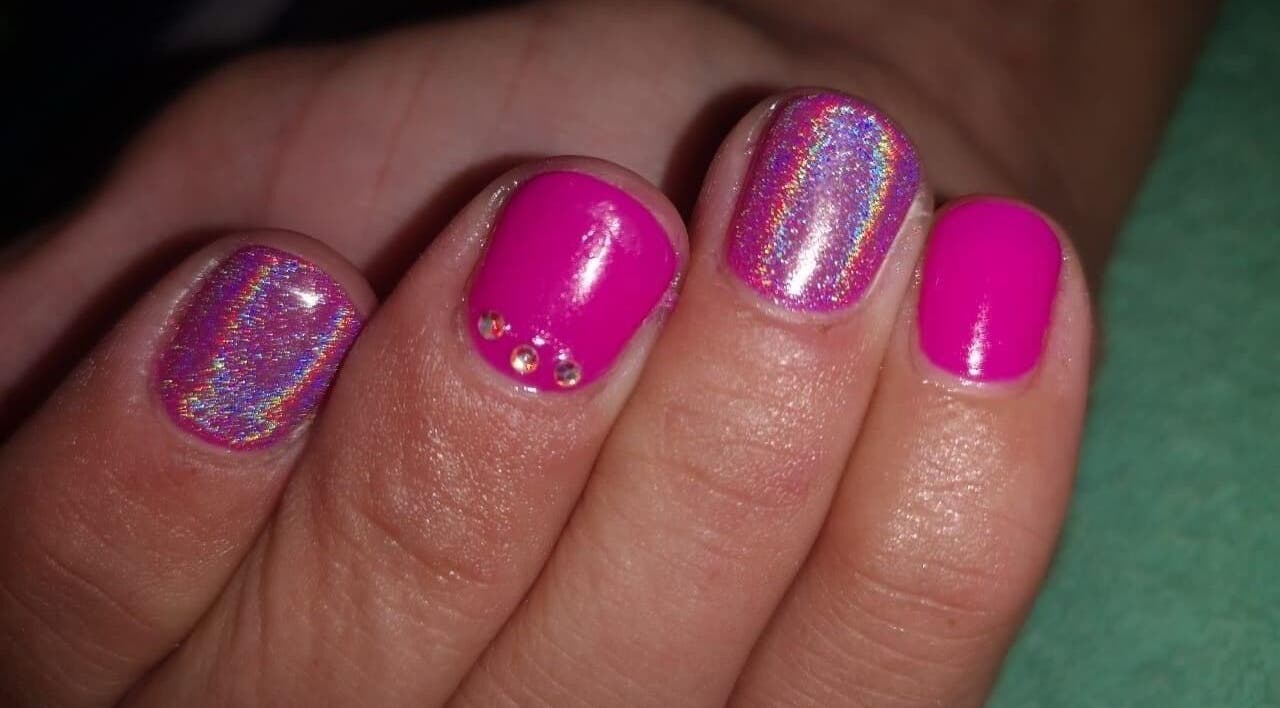 Vibrant pink nails with sparkles at Nail It By Lola, Cape Town, Western Cape, ZA.