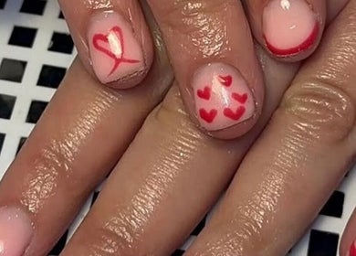 Elegant heart nail art at Beauty By Poppy Marina, Bury, England, GB. Perfect for beauty lovers.