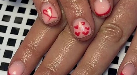 Elegant heart nail art at Beauty By Poppy Marina, Bury, England, GB. Perfect for beauty lovers.