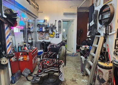 Eclectic interior of Big Bad Wolf Barbershop in Singapore, Singapore, SG showcasing a unique and stylish setup.