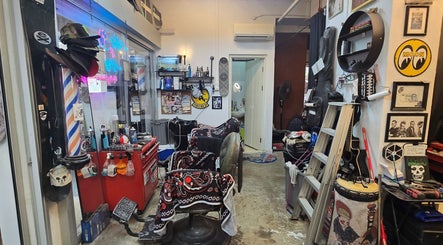Eclectic interior of Big Bad Wolf Barbershop in Singapore, Singapore, SG showcasing a unique and stylish setup.