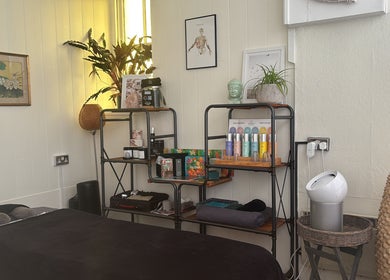 Cozy treatment room at Wellness Studio, featuring relaxing decor in South Molton, England, GB.