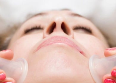 Facial cupping treatment at Wellness Studio in South Molton, England, GB enhances skin glow and relaxation.
