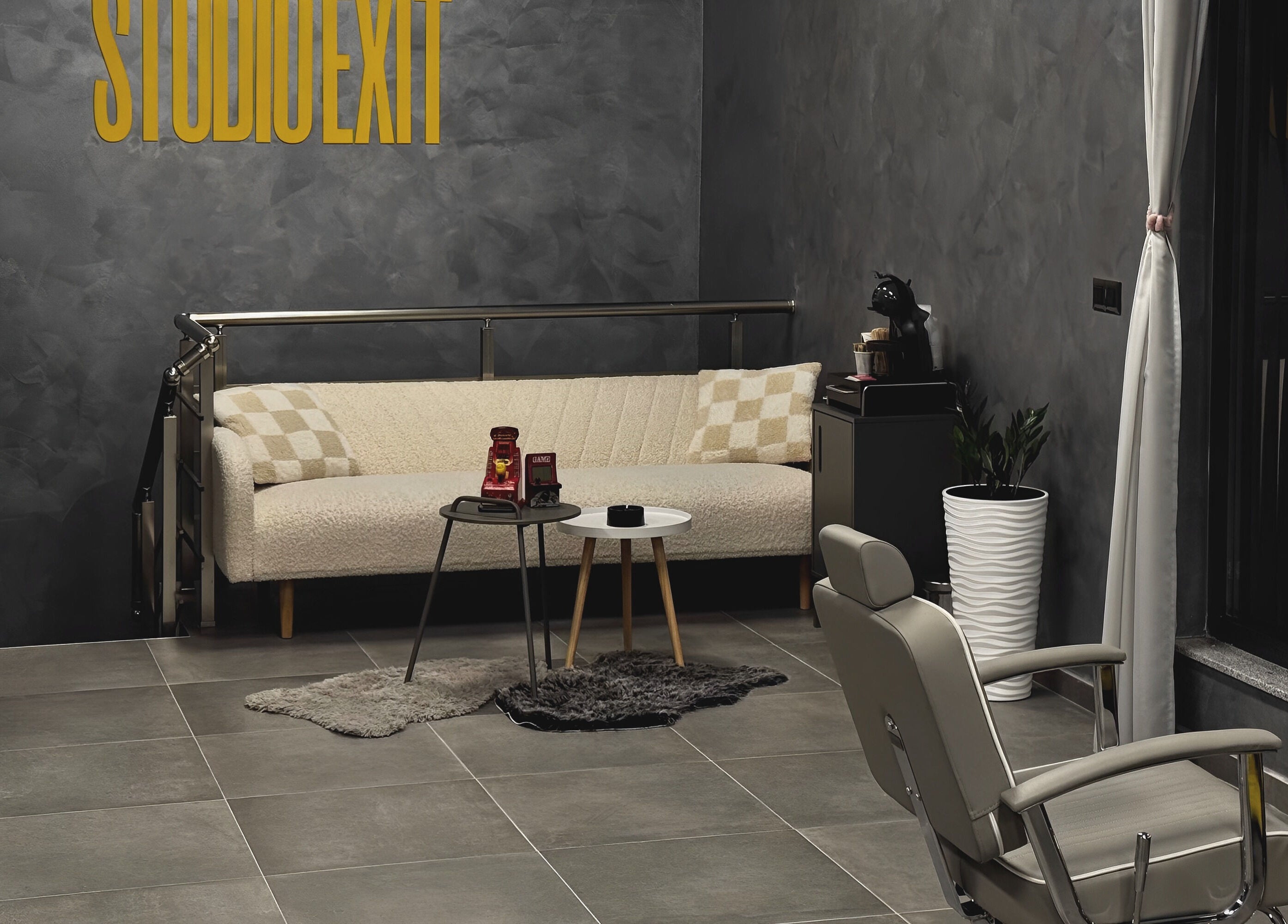 Modern, cozy lobby of Studio Exit in Plovdiv, Plovdiv, BG with stylish seating and decor.