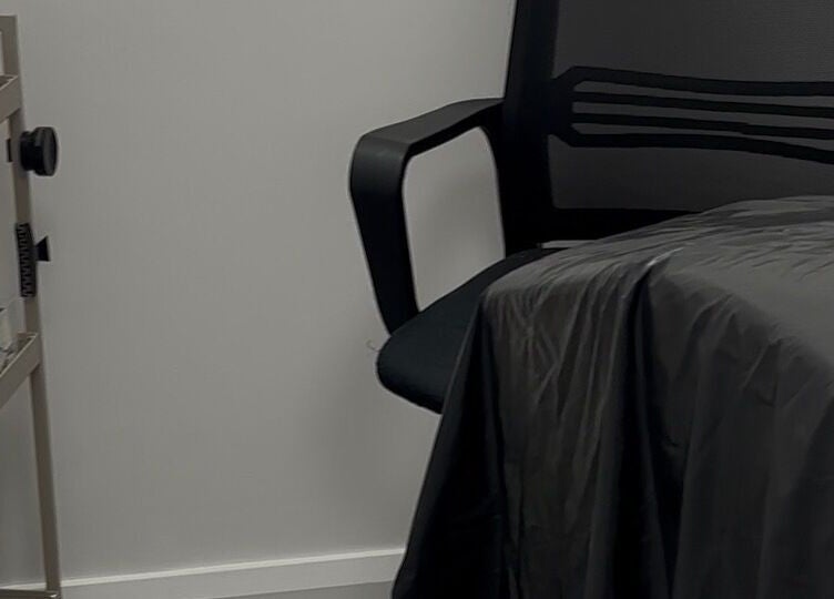 Relaxing interior at Obsidian Lounge, Dublin, County Dublin, IE, featuring a treatment chair and beauty supplies.