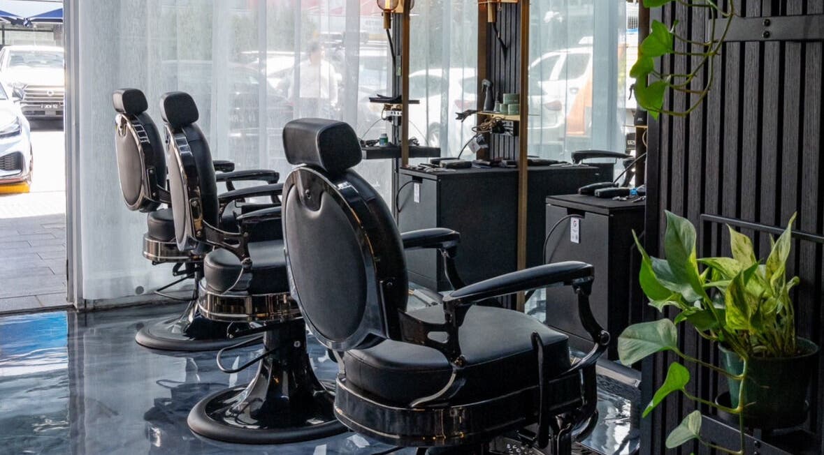 Modern salon chairs at Omen Collective in Fortitude Valley, Queensland, AU, showcase style and comfort.