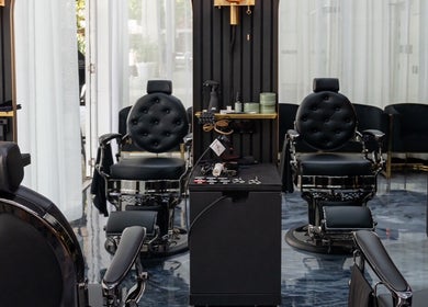 Luxurious salon chairs at Omen Collective in Fortitude Valley, Queensland, AU, showcasing elegant interiors.