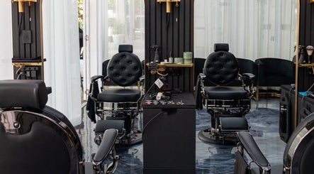 Luxurious salon chairs at Omen Collective in Fortitude Valley, Queensland, AU, showcasing elegant interiors.