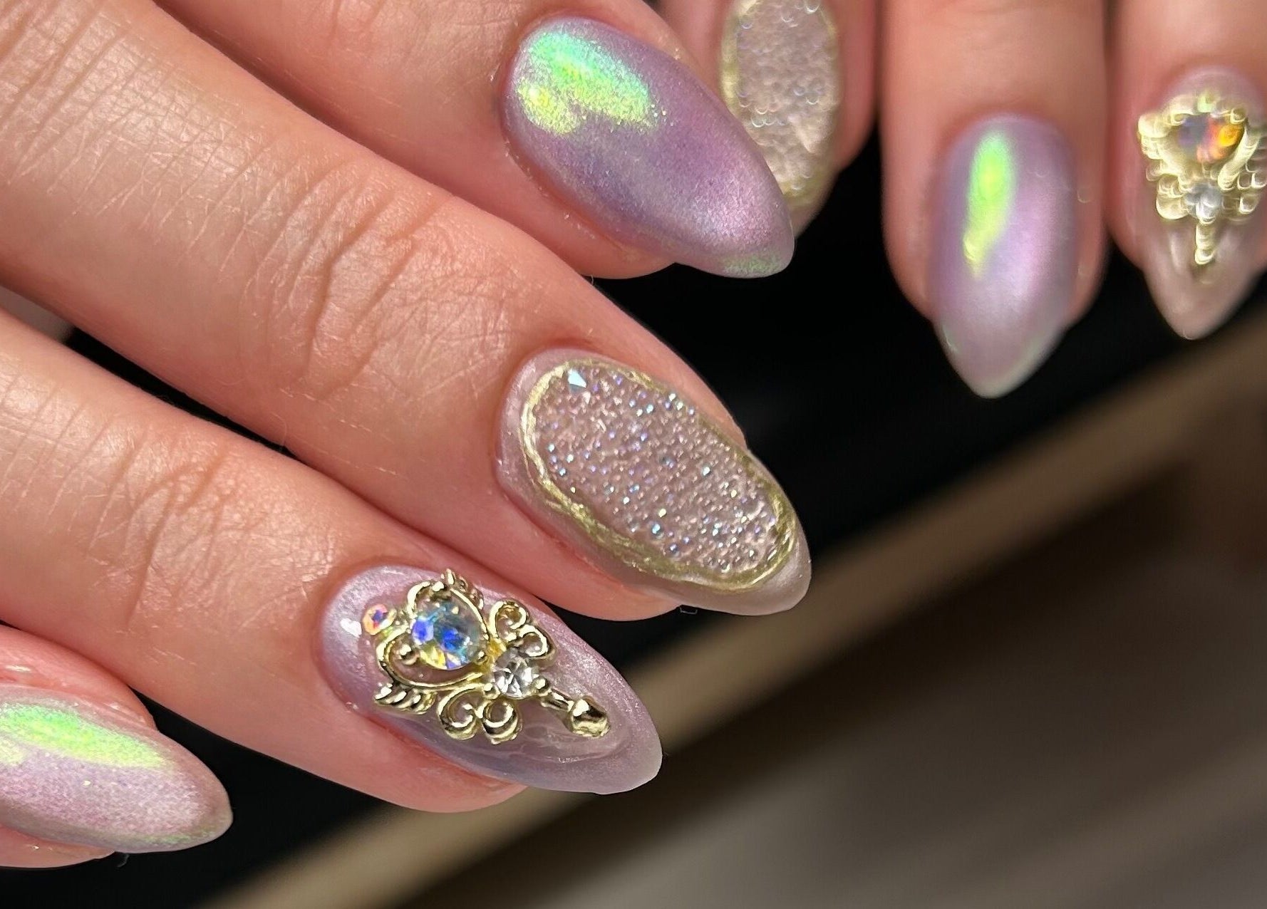 Elegant nail art with gems at Cured by Margaret, Guelph, Ontario, CA.