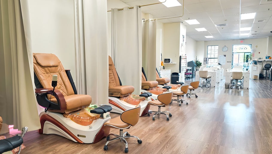 Intricate pedicure chairs at T-Nails Glam Studio in Providence, Rhode Island, US offering serene beauty experiences.