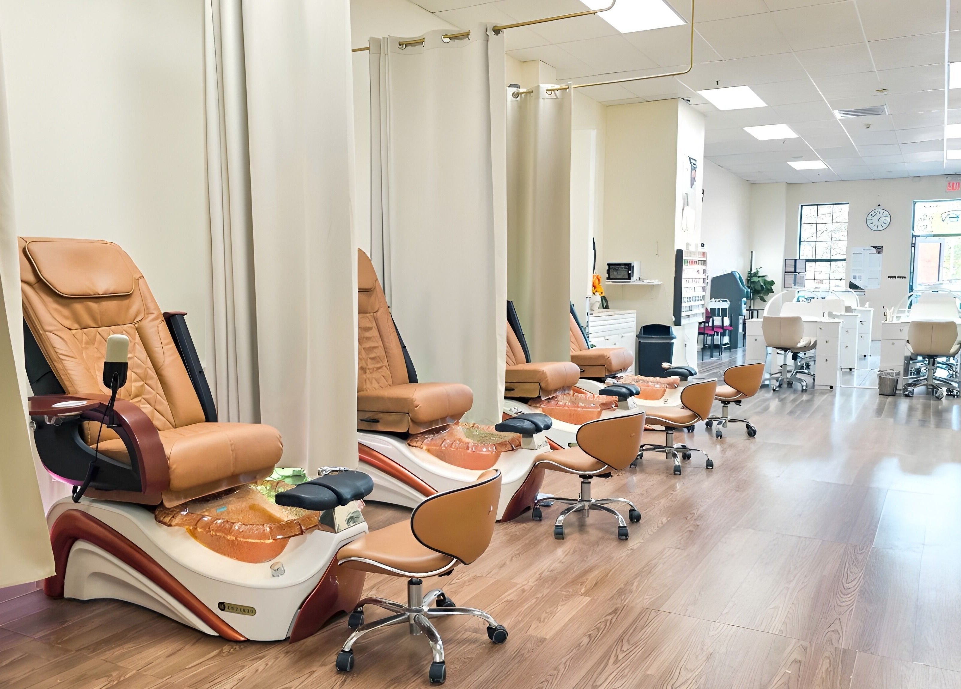 Intricate pedicure chairs at T-Nails Glam Studio in Providence, Rhode Island, US offering serene beauty experiences.