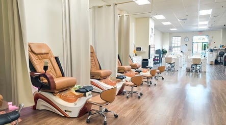 Intricate pedicure chairs at T-Nails Glam Studio in Providence, Rhode Island, US offering serene beauty experiences.