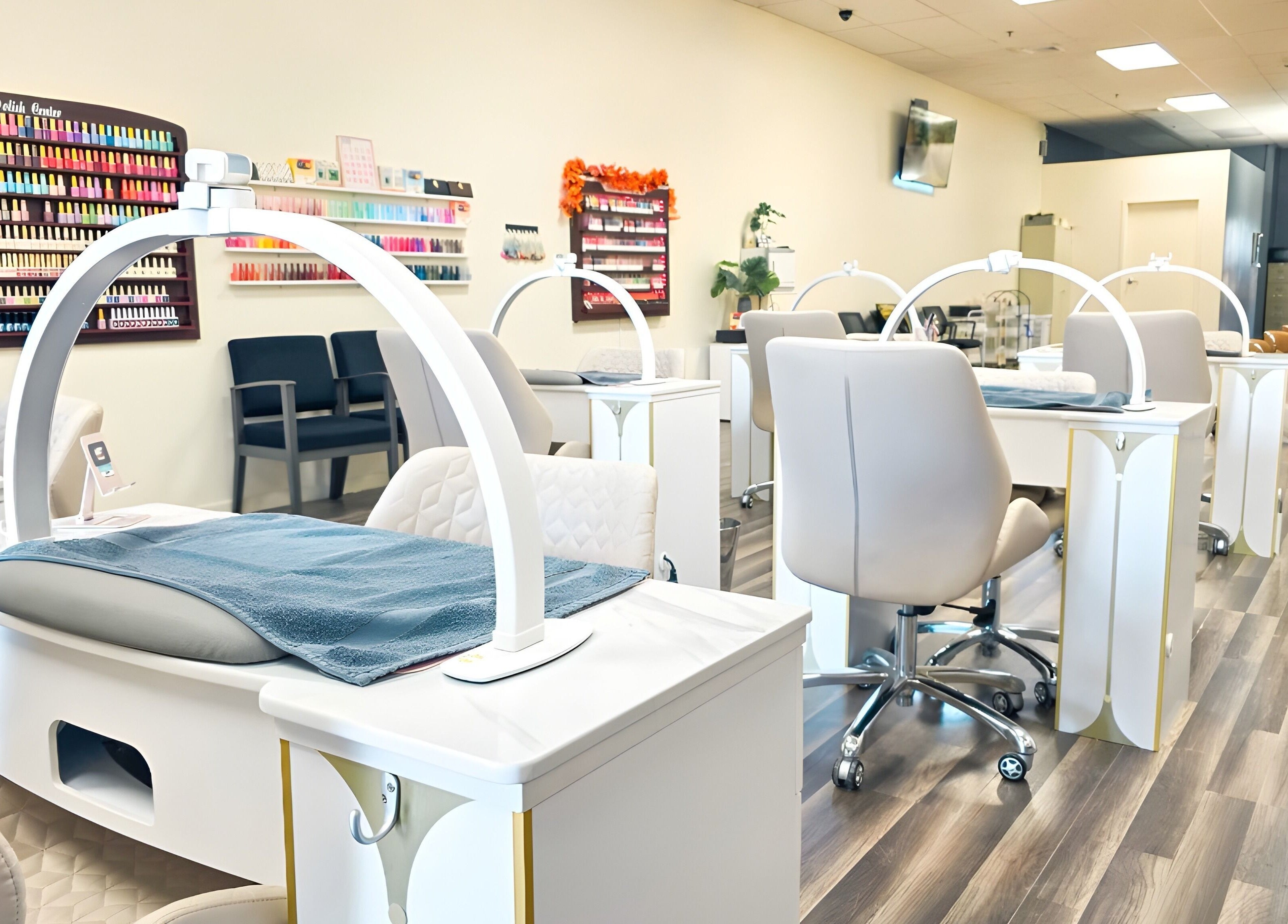 Modern nail salon interior of T-Nails Glam Studio in Providence, Rhode Island, US with sleek workstations.