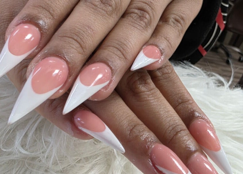 Stunning stiletto nails with pink and white design at T-Nails Glam Studio, Providence, Rhode Island, US.