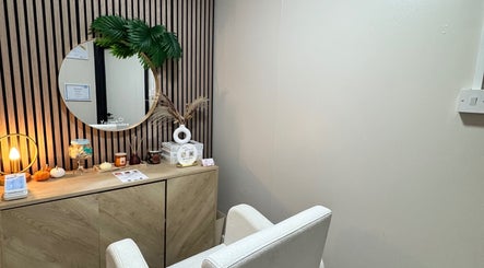 Calm treatment room at Millie Grace Beauty, Barry, Wales, GB, featuring elegant decor and soft lighting.