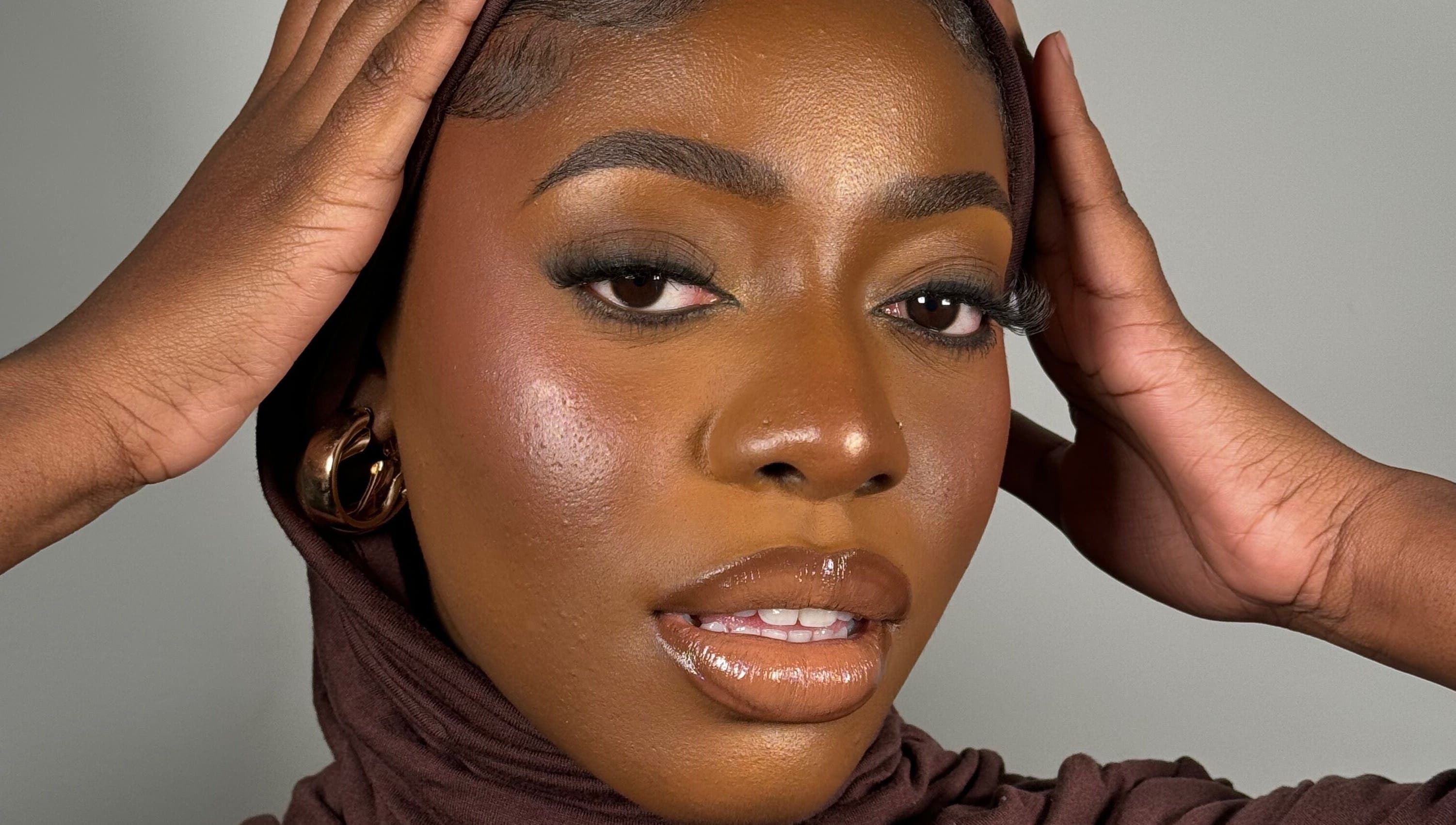 Elegant beauty portrait at INTISAR, London, England, GB showcasing expert makeup artistry and style.