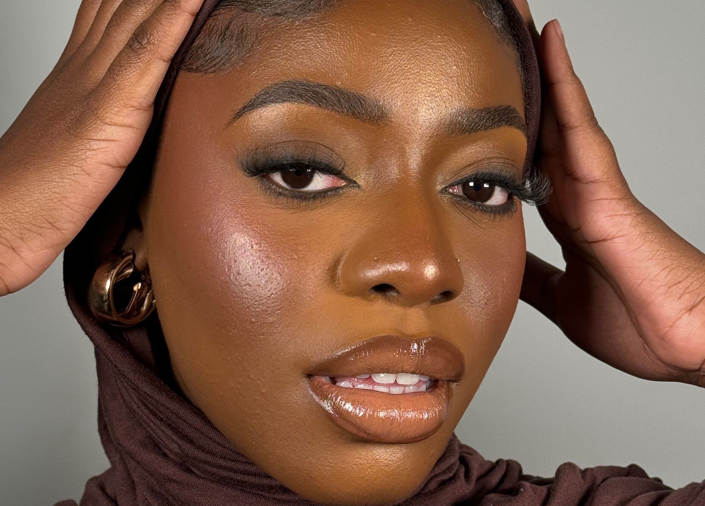 Elegant beauty portrait at INTISAR, London, England, GB showcasing expert makeup artistry and style.