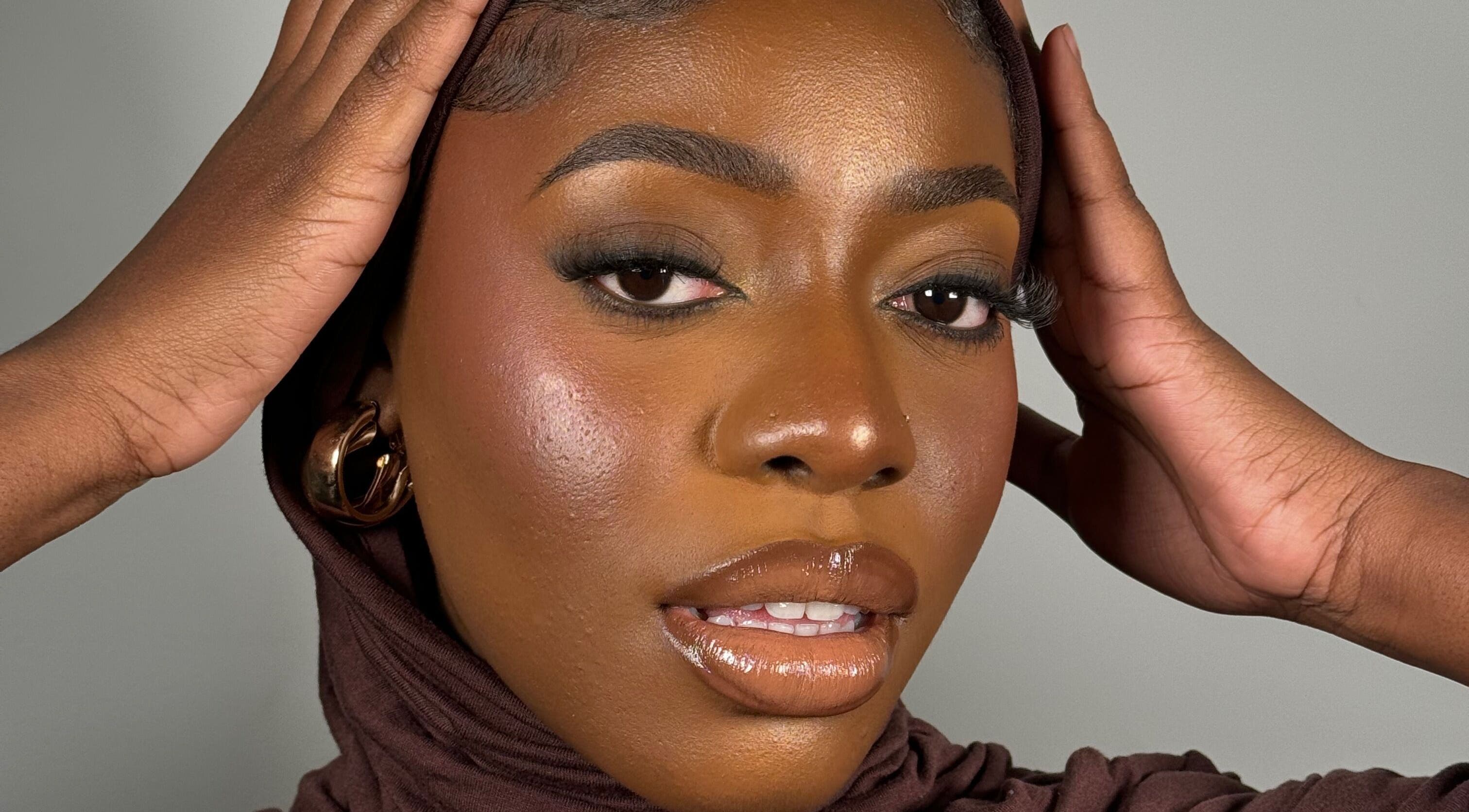 Elegant beauty portrait at INTISAR, London, England, GB showcasing expert makeup artistry and style.