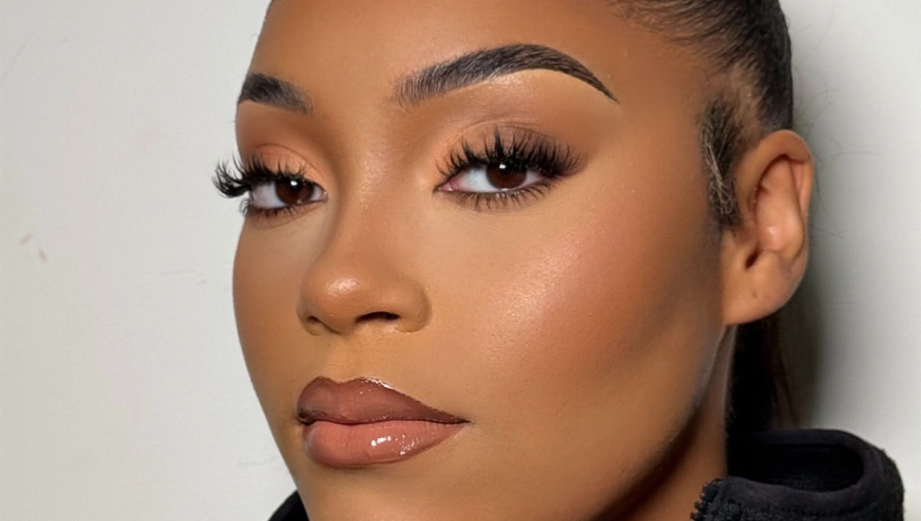 Close-up of flawless makeup by INTISAR in London, England, GB showcasing natural elegance.