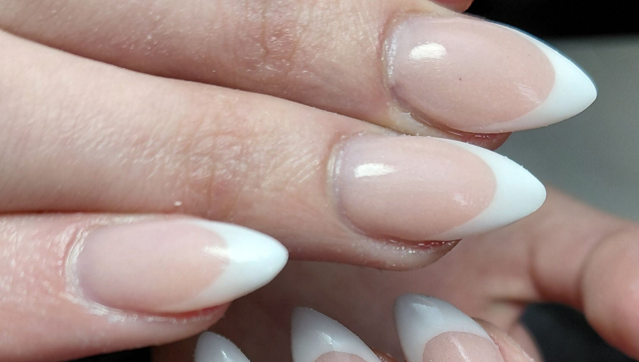 Stylish French manicure at Damour Nails and Beauty in Kempton Park, Gauteng, ZA, enhancing elegant nail beauty.