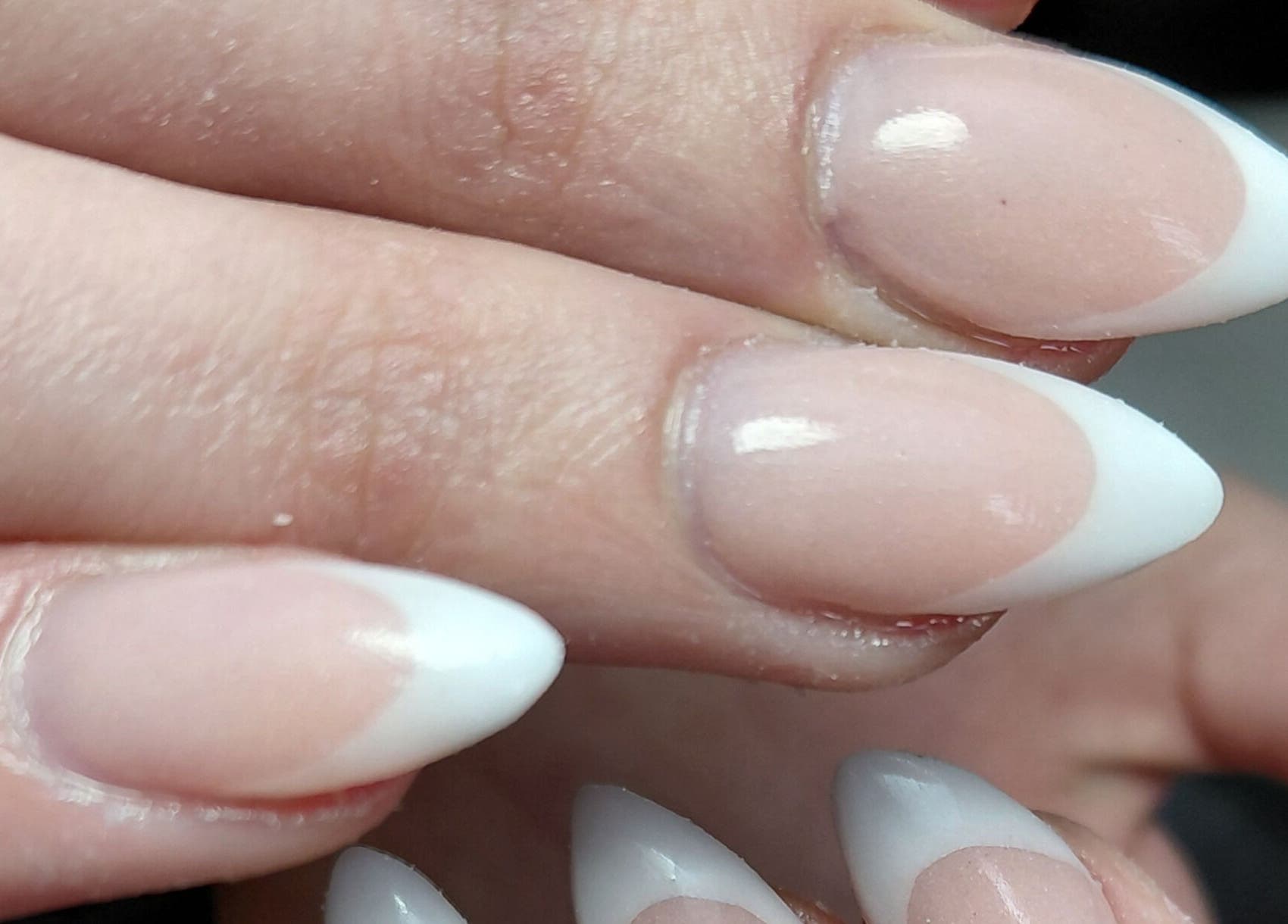 Stylish French manicure at Damour Nails and Beauty in Kempton Park, Gauteng, ZA, enhancing elegant nail beauty.