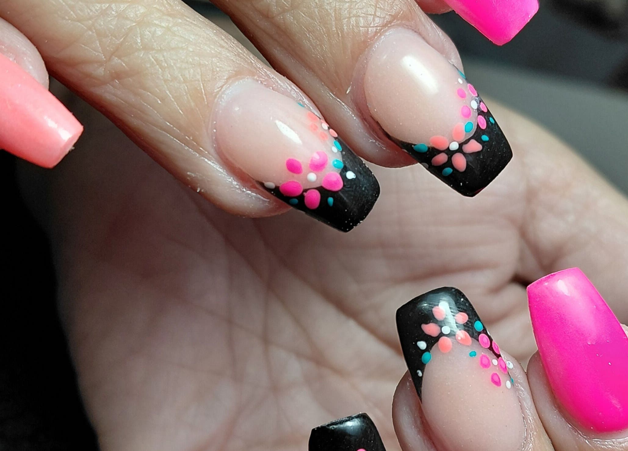 Close-up of vibrant floral nail art at Damour Nails and Beauty, Kempton Park, Gauteng, ZA.