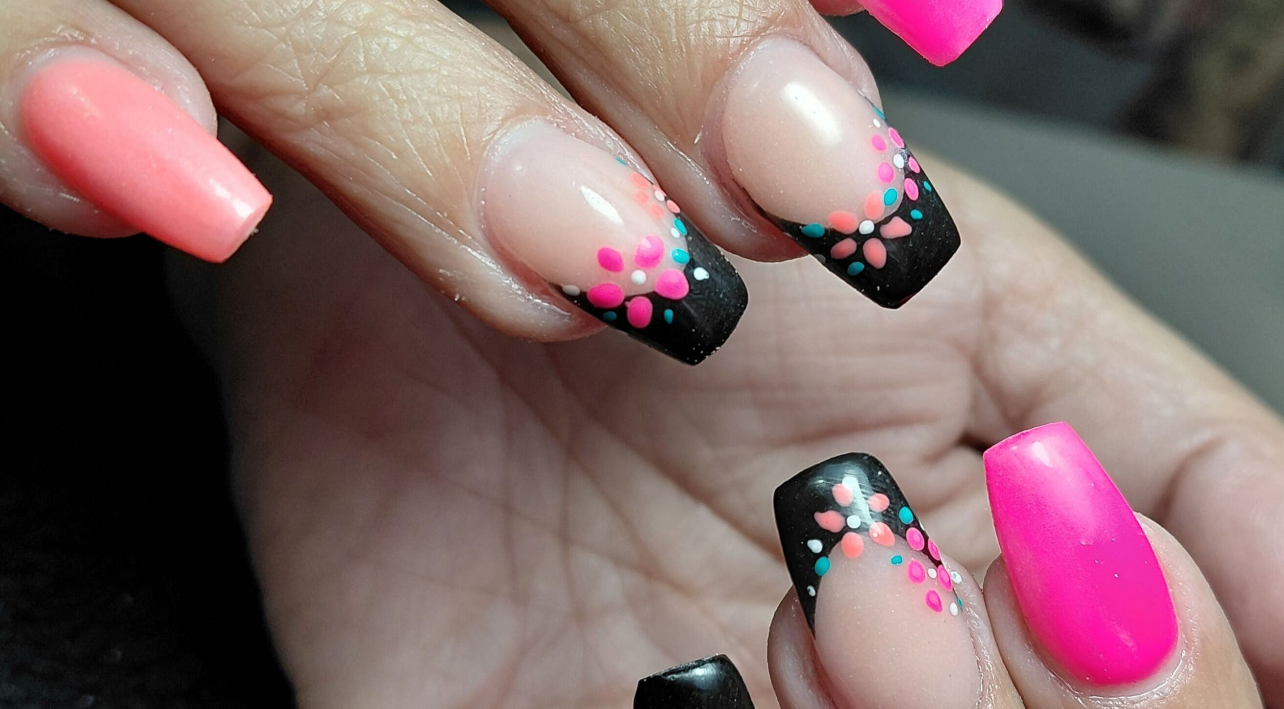Close-up of vibrant floral nail art at Damour Nails and Beauty, Kempton Park, Gauteng, ZA.