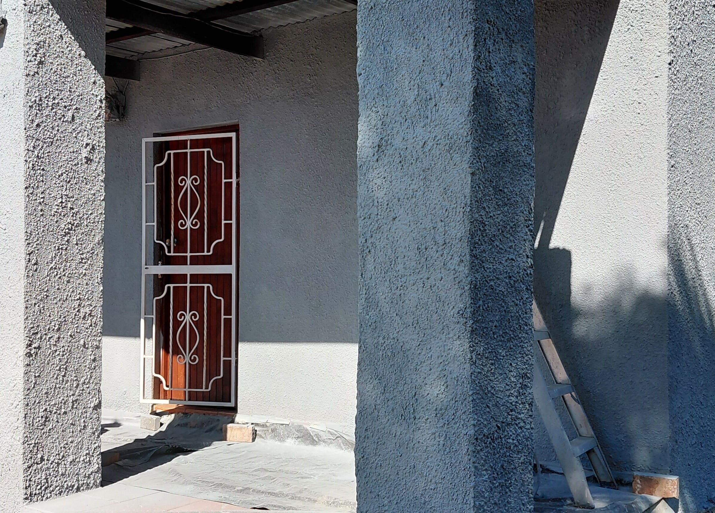 Modern entrance at Damour Nails and Beauty, Kempton Park, Gauteng, ZA showcasing stylish architectural details.