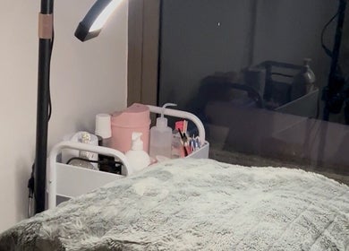 Cozy treatment area at The Lab Studio, Randwick, New South Wales, AU with fluffy blanket and skincare essentials.