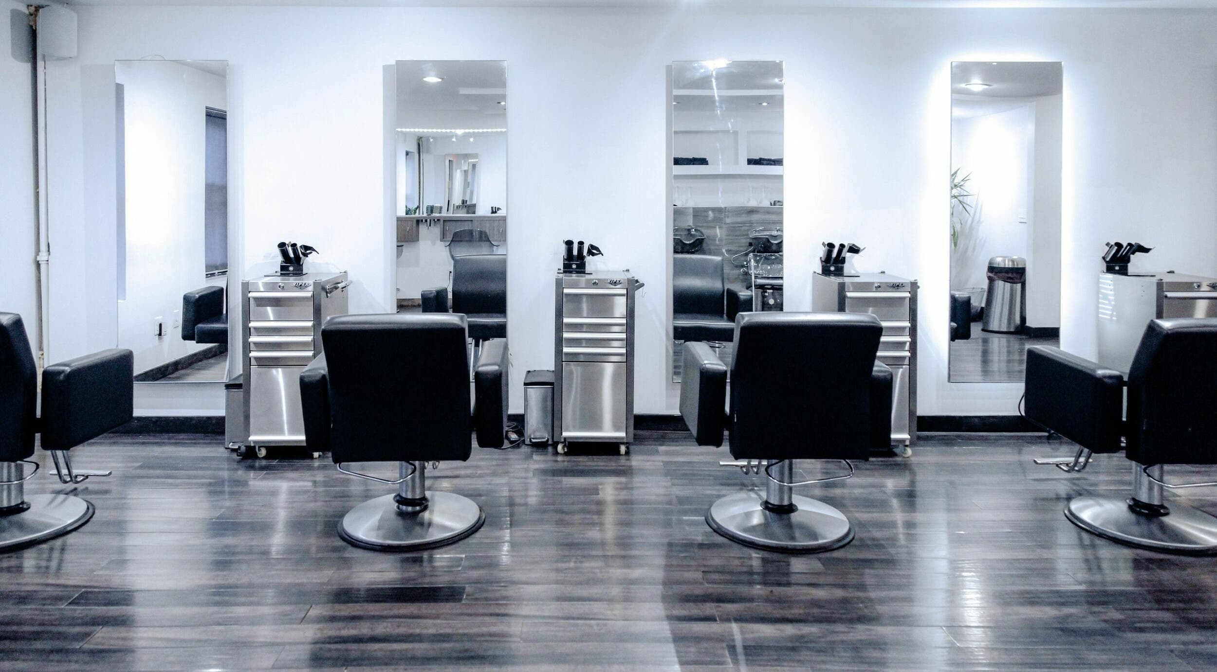 Modern salon chairs and mirrors at H2 Salon Brooklyn, New York, New York, US offering stylish beauty services.