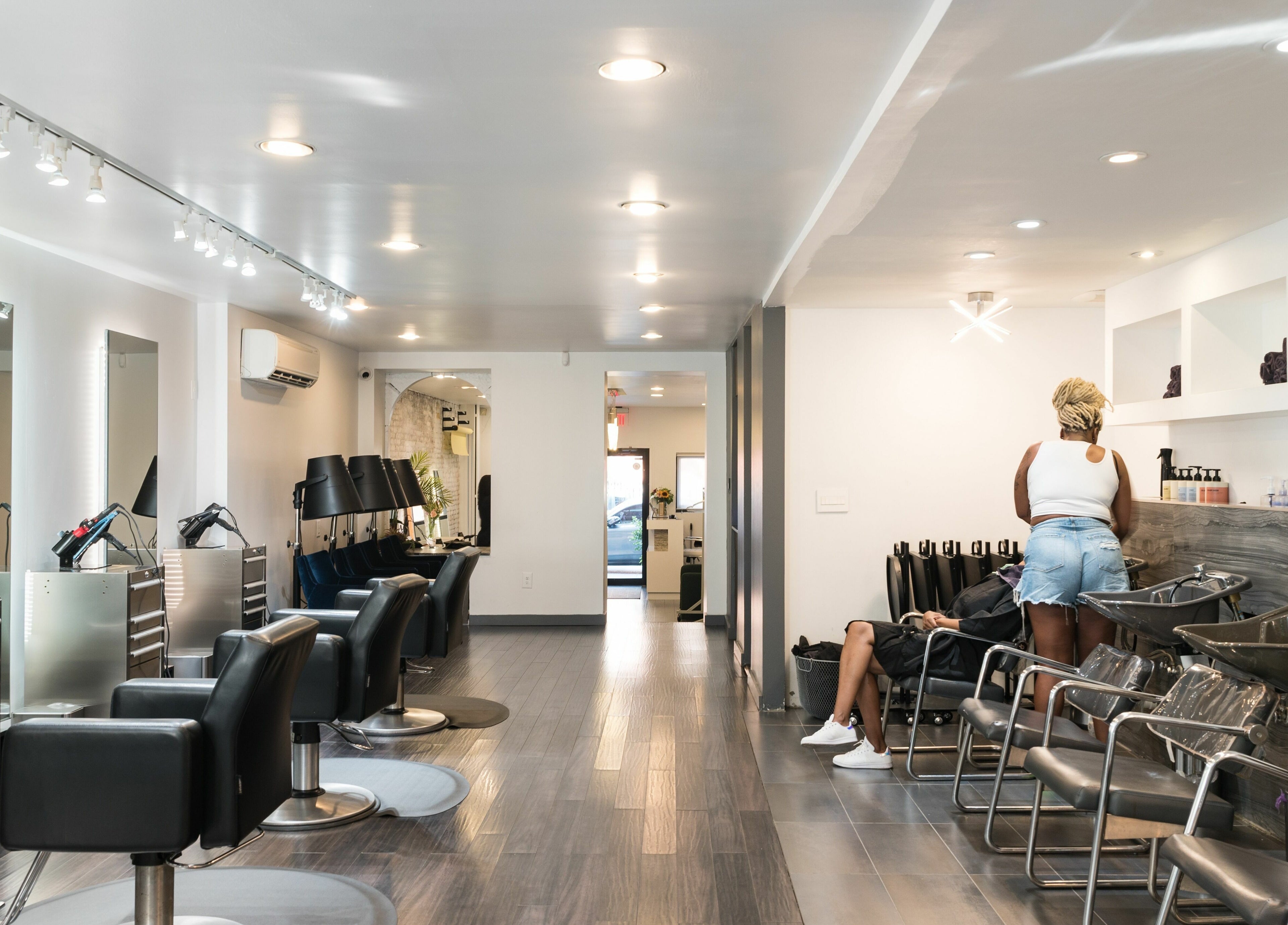 Modern interior of H2 Salon Brooklyn, New York, New York, US with stylish seating and contemporary decor.