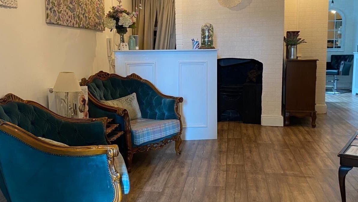 Elegant seating area at Movement Clinics, Loughborough, England, GB, featuring vintage decor.